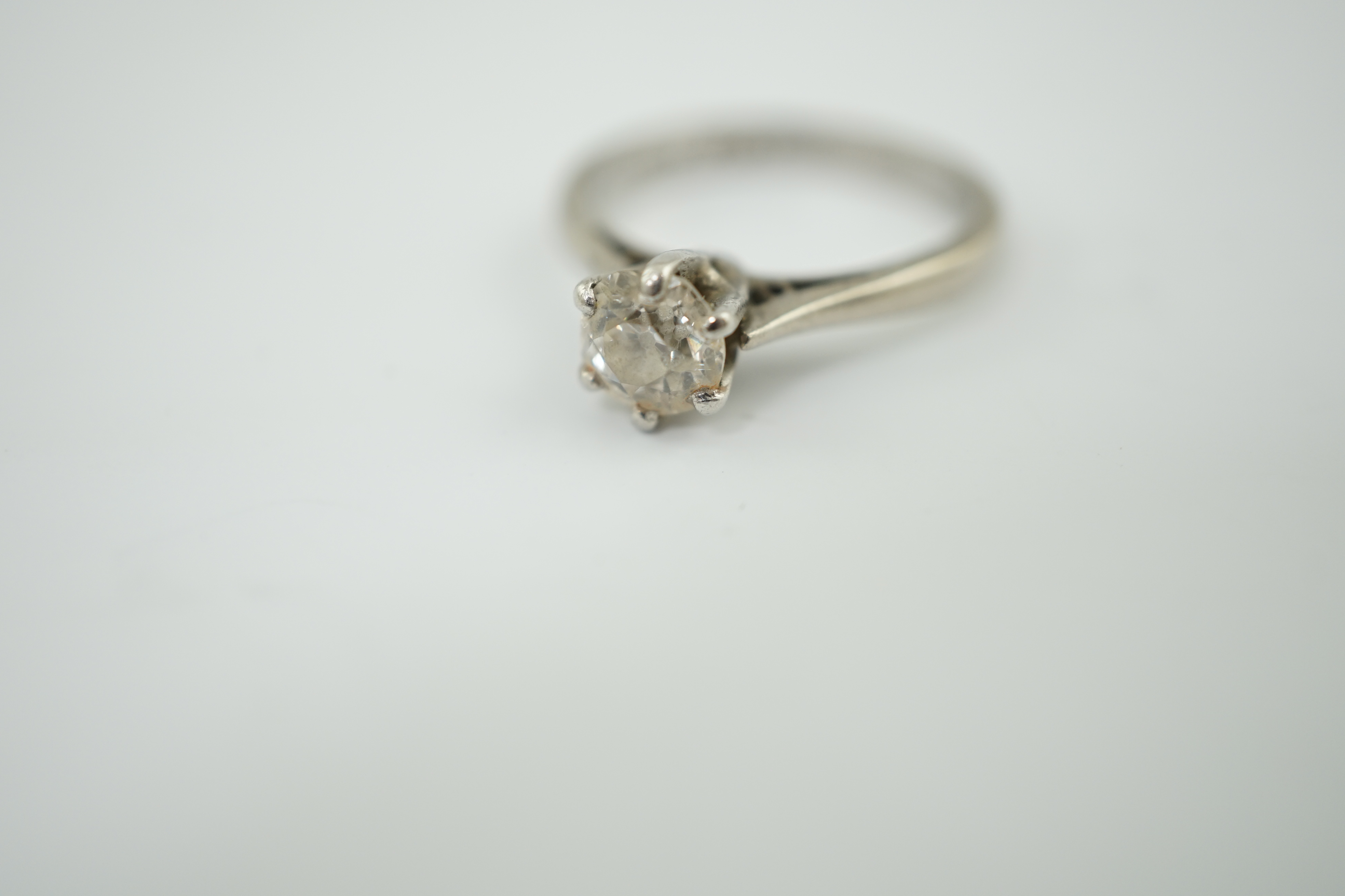 An 18ct white gold, platinum and solitaire diamond ring